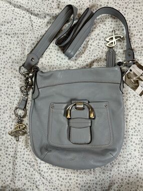 B Makowsky Gray Leather Crossbody Bag with Buckle Pocket and Charms NWT